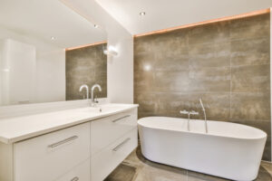 Comfortable bathroom in a minimalist style with a cozy bathtub